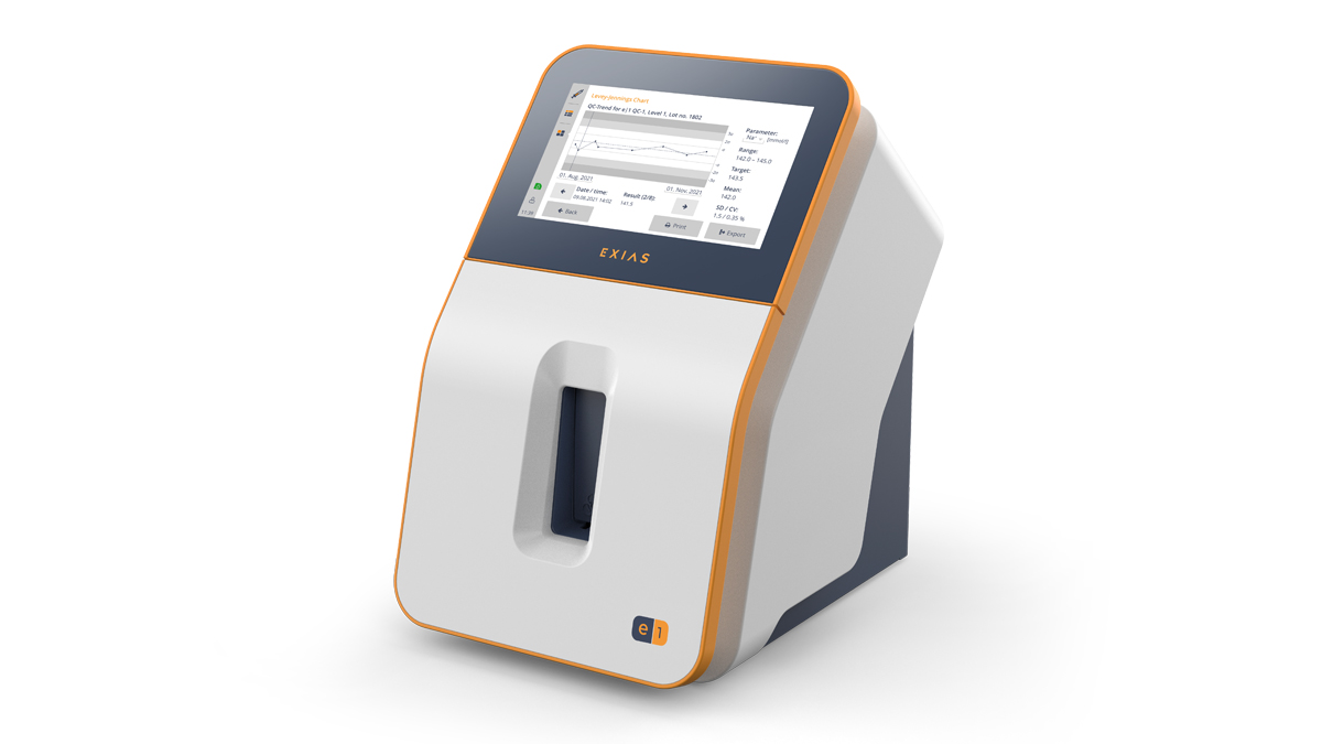 En modern medicinsk apparat med en pekskärmsdisplay som visar diagram och data, märkt "EXIAS" på framsidan.